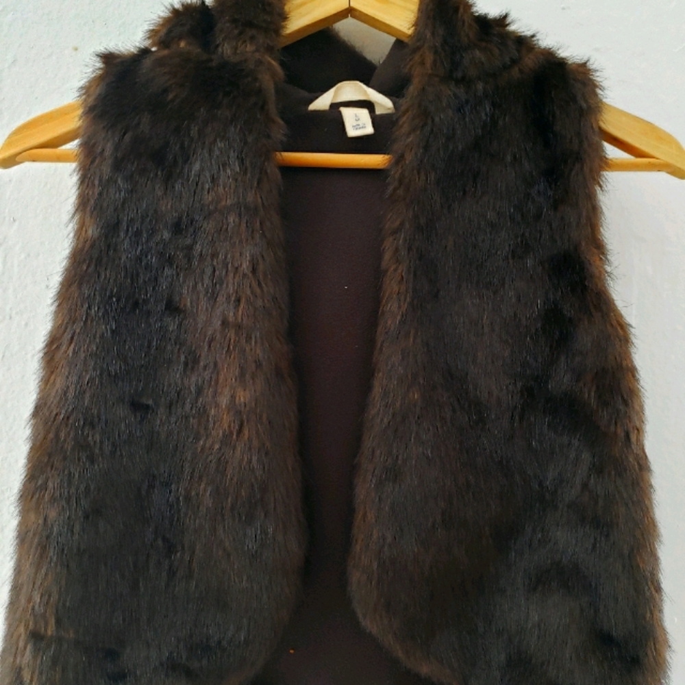 Girls faux fur vest with a hood